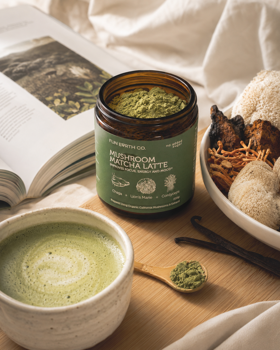 Mushroom Matcha Latte jar with prepared green matcha latte and mushroom ingredients